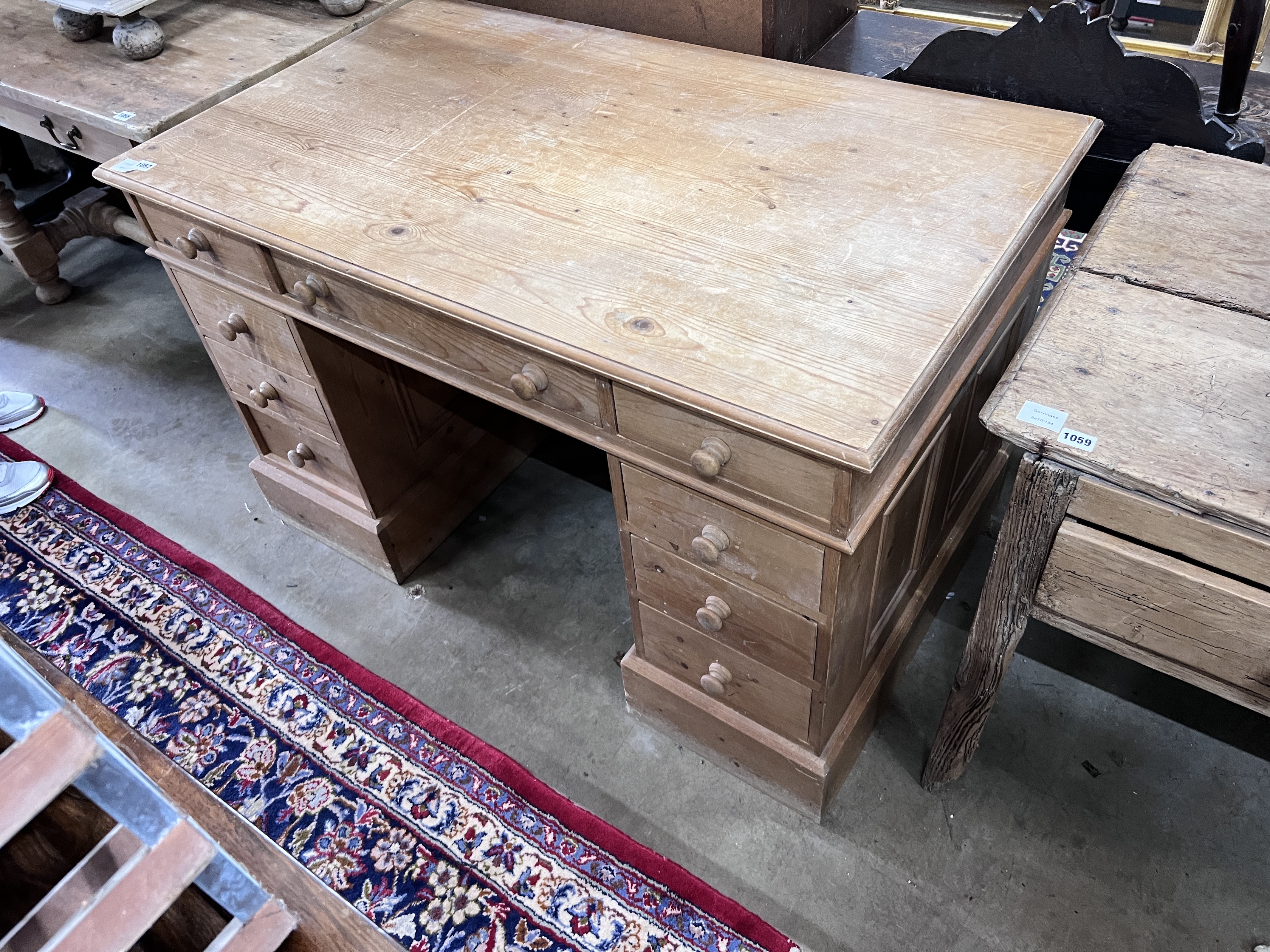 A modern Victorian style pine pedestal desk, width 120cm, depth 72cm, height 76cm